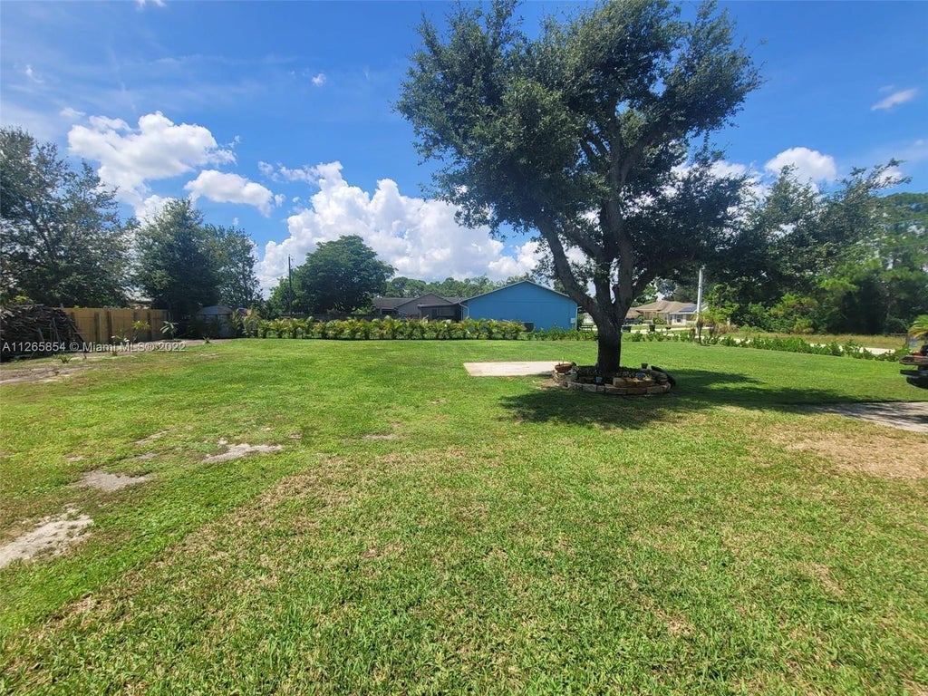 Photo of 280 SW Todd Ave, Port Saint Lucie, FL 34983 (MLS # A11265854)