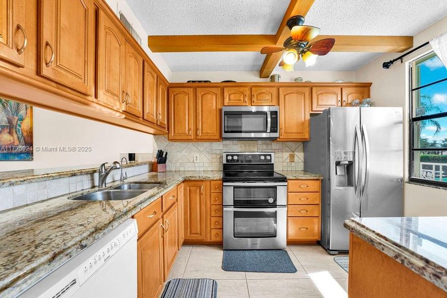 Discover this beautifully renovated 2-bedroom, 2-bath condo with a versatile den/bonus room in the sought-after Whitehall community of Boca Raton. This spacious unit features a Mediterranean-inspired design with stylishly updated kitchen and bathrooms, elegant floors, and stainless steel appliances. Enjoy breathtaking lake views from your private balcony and immerse yourself in the serene surroundings. Conveniently located near Boca Town Center, Mizner Park, pristine beaches, and top-rated schools, this home is perfect for both relaxation and accessibility. The community offers fantastic amenities, including a pool, clubhouse, and walking trails. With modern upgrades, great space, and charm, this is the ideal place to call home!
