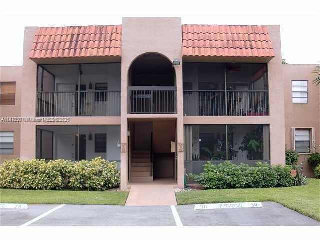 Spacious & Beautifully Remodeled 1,080 SQ FT 2 bedroom 2 bathroom split floor plan condo in the heart of Sunrise. Very well kept corner unit featuring a huge living area and huge walk in closets. 2 screened patios and plenty of storage. Washer and dryer located in the unit. Very close proximity to the pool and barbecue area. CONDO FEE INCLUDES: WATER, INSURANCE, BLDG EXTERIOR, PARKING, POOL, PEST CONTROL, SECURITY, AND MORE! THIS COMMUNITY HAS ENOUGH RESERVES TO QUALIFY FOR A CONVENTIONAL LOAN WITH LESS THAN 20% DOWN. Centrally located to all major highways, BB&T Center, Sawgrass Mall and more! No renting the first year, Complex passed 40 years certification.********* A MUST SEE*************SOLD AS-IS WITH RIGHT TO INSPECT :) SCHEDULE A SHOWING TODAY!