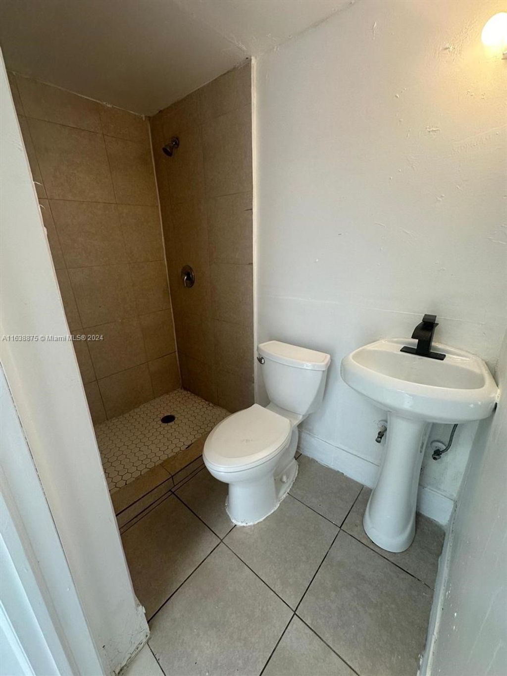 Photo of 633 NW 15th Ave #11, Fort Lauderdale, FL 33311 (MLS # A11638875)