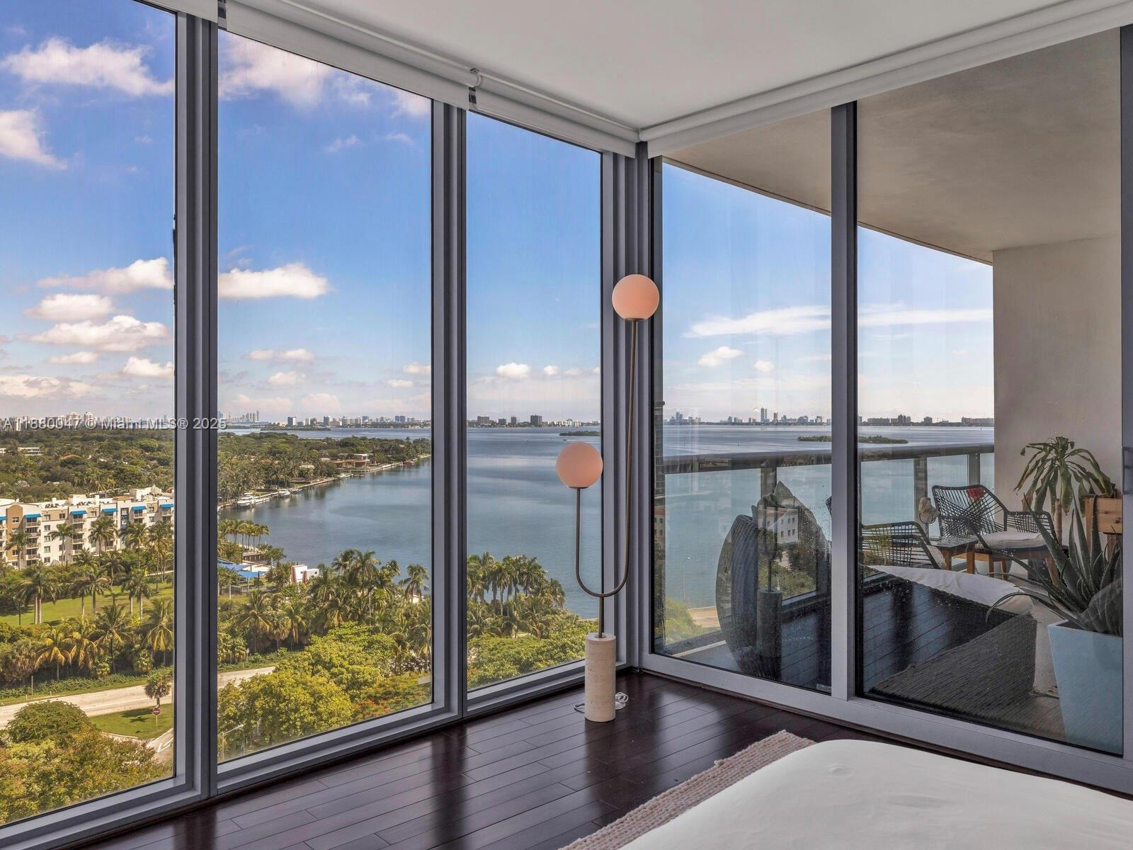 Sweeping bay views, expansive open living, and pristine finishes await you in this must-see luxe Blue Condo residence. Welcome to Vista Blue! Life’s a breeze from the grand balcony, with amazing sunrises over crystal blue Biscayne Bay, perfect for relaxing or entertaining while boat-watching and stargazing. Great features: Brazilian hardwood floors; custom doors; designer lighting; bright granite kitchen with Subzero fridge and breakfast bar; new dishwasher; new washer-dryer; Nest thermostat; and a beautiful powder room. Extra privacy with double-stacked ensuite bedrooms, including the principal suite with luxurious spa-like bathroom, huge walk-in closet, and floor-to-ceiling bay-facing windows. Conveniently adjacent to Design District with two parking spots—one assigned plus one valet.
