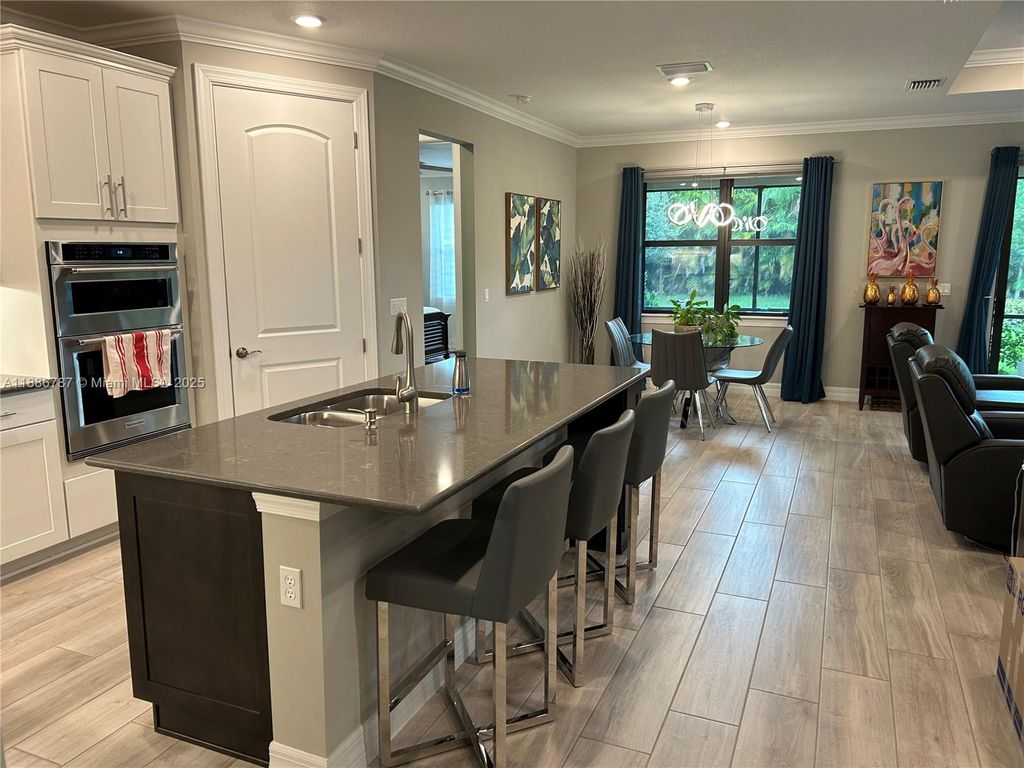 Photo of 4475 S Silverwood Ln S, Oakland Park, FL 33309 (MLS # A11886787)