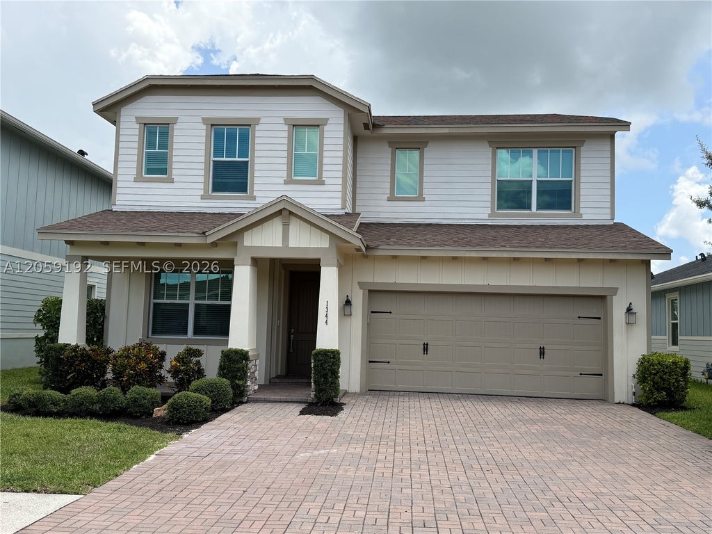 Photo of 1344 Wandering Willow Way, Loxahatchee, FL 33470 (MLS # A12059192)