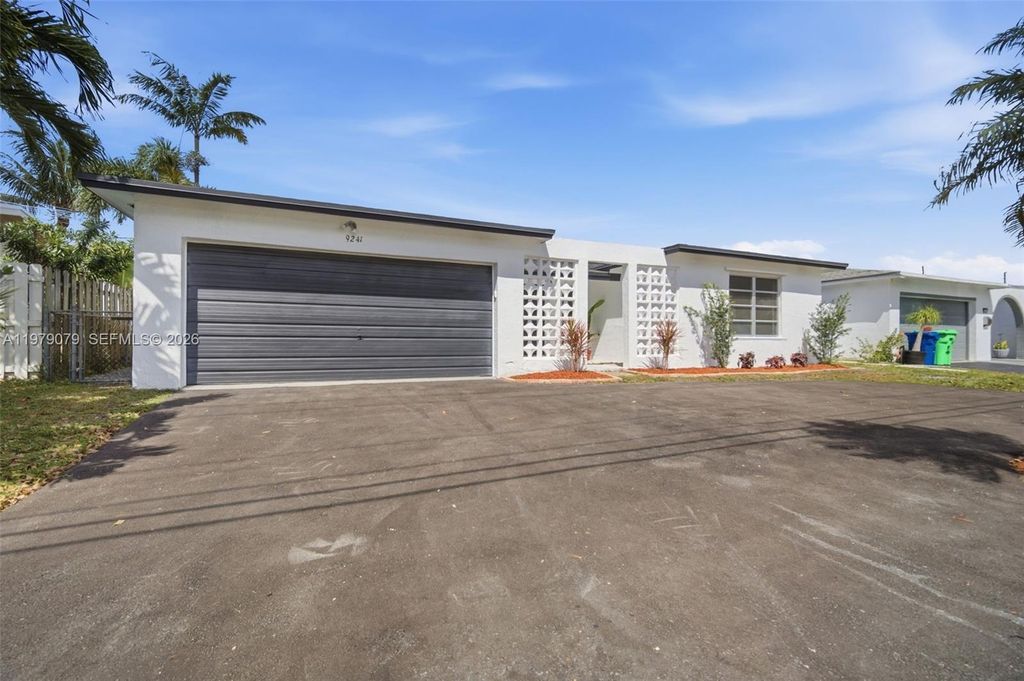 Photo of 9241 Sunset Strip, Sunrise, FL 33322 (MLS # A11979079)