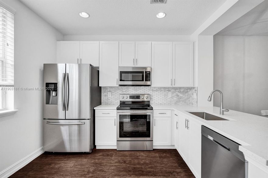 Beautiful and modern Flagler Village Townhome located just minutes from Downtown Fort Lauderdale, Las Olas, the beach, and some of the city’s best restaurants and nightlife. This spacious tri-level residence offers 2 bedrooms, 2.5 bathrooms, and a versatile multi-use room, perfect for a home office or gym. Features include 9-foot ceilings, a one-car garage with additional guest parking nearby, and a modern, open kitchen with matching stainless steel appliances. Both bedroom closets have been recently upgraded with custom built-ins for optimal storage. Enjoy the private balcony overlooking the pool in this boutique 32-unit community, within walking distance to Peter Feldman Park, FAT Village Art Walk, and local dining spots. This townhome perfectly blends style, comfort, and location!