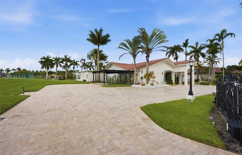 Photo of 16170 Saddle Ln, Weston, FL 33326 (MLS # A12041926)