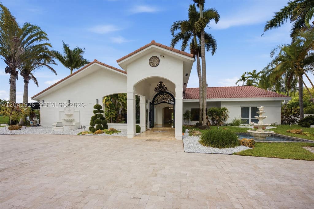 Photo of 16170 Saddle Ln, Weston, FL 33326 (MLS # A12041926)