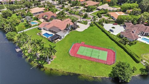 Photo of 16170 Saddle Ln, Weston, FL 33326 (MLS # A12041926)