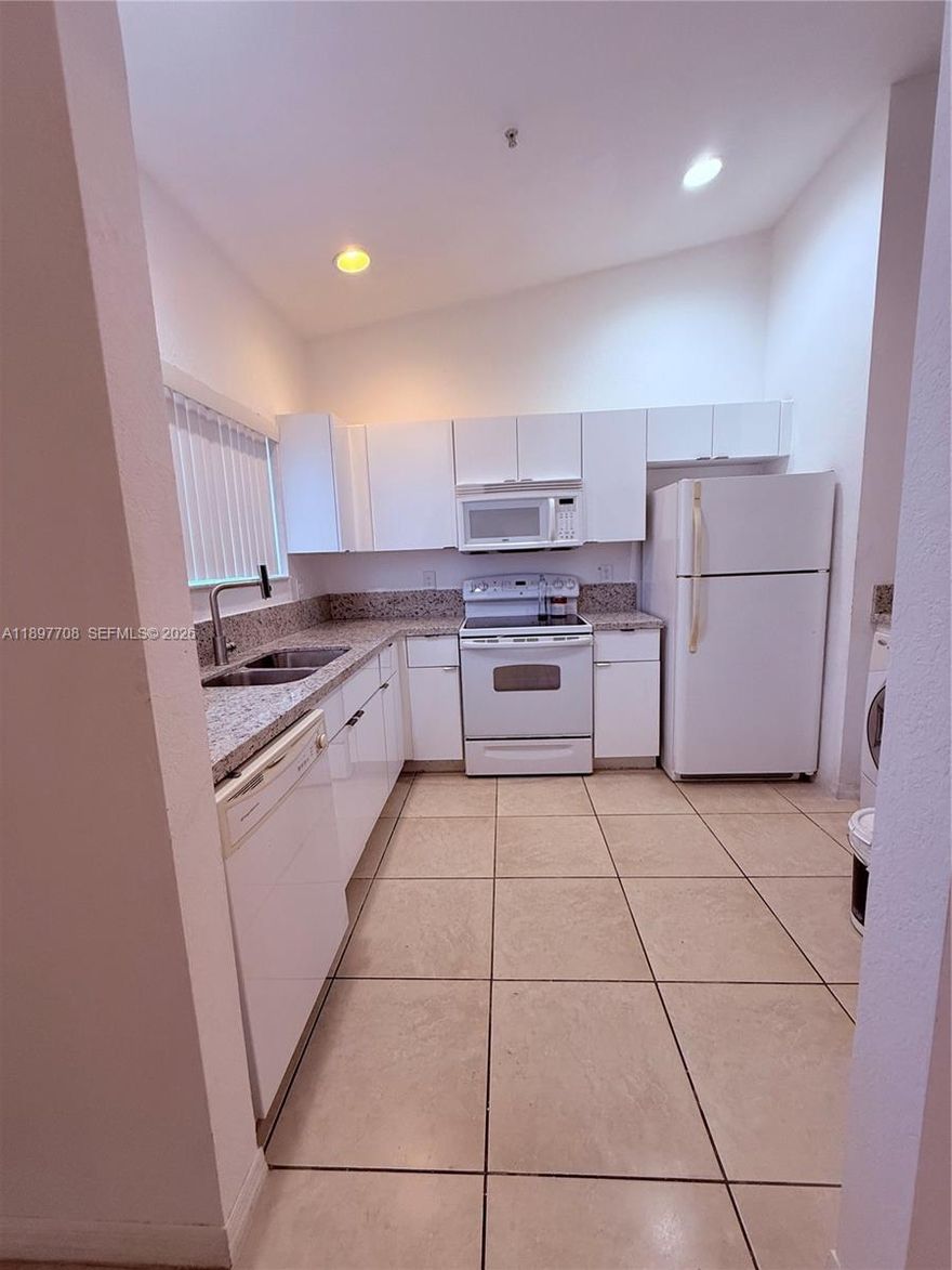 2/2 Villa in Pembroke Park, Updated Kitchen with quarts new tops and cabinets, Updated vanities in both bathrooms, . Low HOA fees, upgraded led lights in the entire unit, washer and dryer. 1 assigned parking and visitor parking per unit, additional visitor parking can be found on the community. Gated community with surveillance cameras. . Hurricane shutters ready. Rent from day 1 for +/-$2300