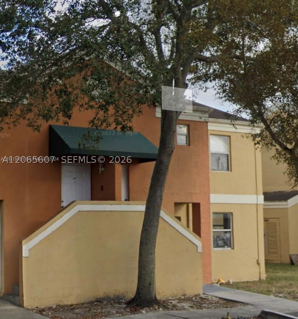 Photo of 2421 NW 56th Ave #2-103, Lauderhill, FL 33313 (MLS # A12065607)