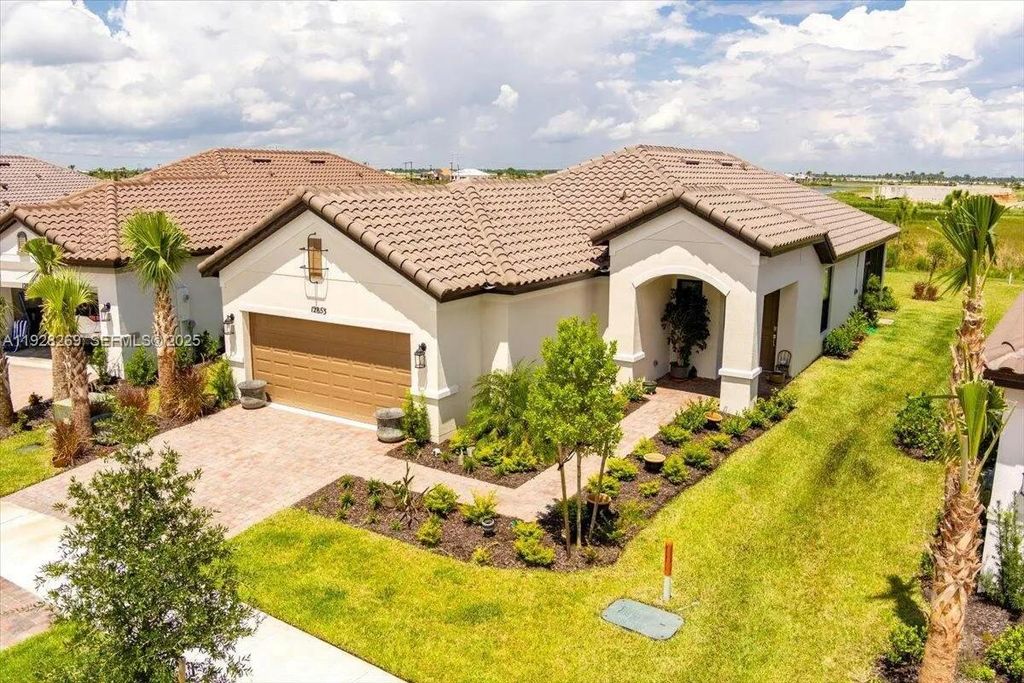 Photo of 12853 SW Ambra St, Port St Lucie, FL 34987 (MLS # A11928269)