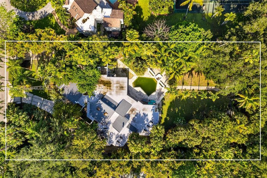 Opportunity to build your dream home on a quiet cul-de-sac street in South Miami. Sitting on nearly an acre lot, this home is nestled behind mature trees and a gated entrance, ensuring privacy and tranquility. While the property requires some updating and renovation, it offers the perfect canvas for a buyer with vision and a desire to renovate and make it their own. Whether you're looking to expand the home's footprint, add modern amenities, or simply build from the ground up, this property has the potential to be a dream home for years to come. Don't miss your chance to make it yours!