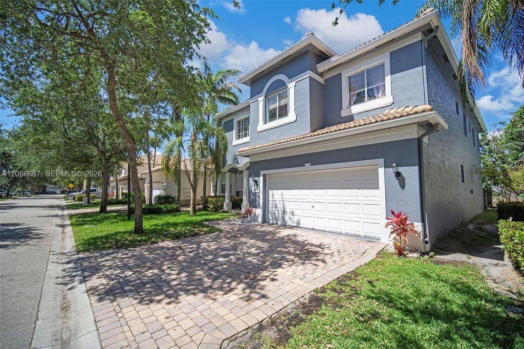 Photo of 1225 Rosegate Blvd, Riviera Beach, FL 33404 (MLS # A12006667)