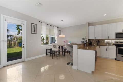 Tiny photo for 1225 Rosegate Blvd, Riviera Beach, FL 33404 (MLS # A12006667)