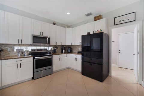 Tiny photo for 1225 Rosegate Blvd, Riviera Beach, FL 33404 (MLS # A12006667)