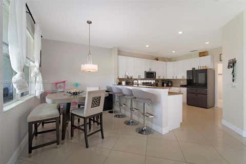 Tiny photo for 1225 Rosegate Blvd, Riviera Beach, FL 33404 (MLS # A12006667)