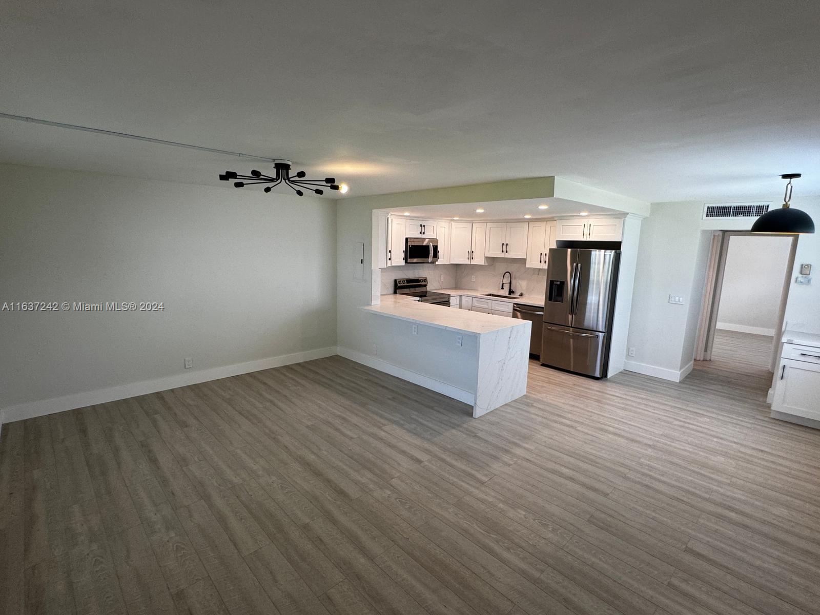 Fully Renovated and updated first floor unit in gated Delray Beach community! Condo is turnkey with a brand new kitchen, all new stainless steel appliances and high quality custom wood cabinets. Beautiful Calcutta countertops featured in both the updated open concept kitchen and bathrooms. 55+ Resort Style Amenities: 3 Clubhouses, 5 Pools, Auditorium shows, golf course, pickleball, tennis, racquetball, clubs, etc.