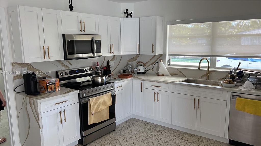 Photo of 750 Polk St, Hollywood, FL 33019 (MLS # A11991183)