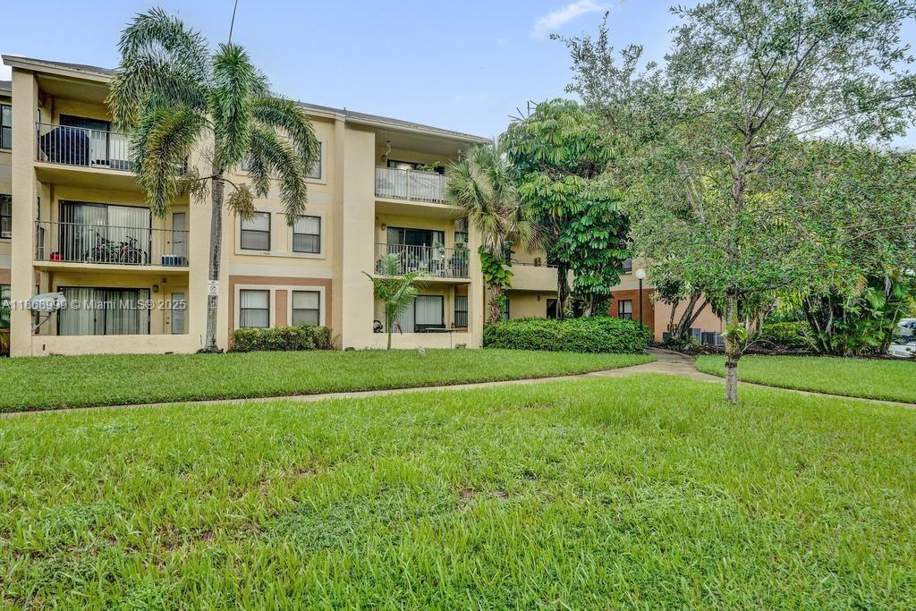Welcome to this charming 2-bedroom, 2-bathroom condo in the desirable Summerbreeze community, offering a spacious 1,024 sq. ft. of living space. Situated on the THIRD floor, this condo features vaulted ceilings, laminate flooring, and an open floor plan, making it feel bright and airy. The kitchen is equipped with modern appliances including a dishwasher, microwave, refrigerator, and a washer/dryer combo for added convenience. Enjoy the outdoors on your private balcony or take advantage of the community amenities such as a clubhouse, fitness center, pool, and sauna. With low monthly maintenance fees covering building exterior, common areas, landscaping, pool service, and more, this condo is perfect for easy living.