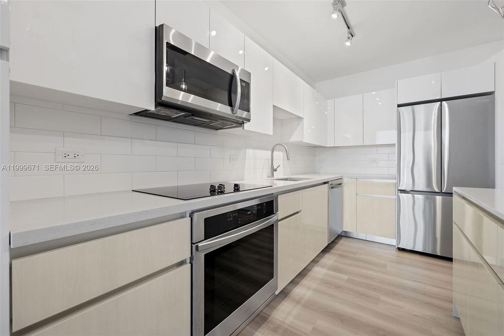 Photo of 101 Diplomat Pkwy #1704, Hallandale Beach, FL 33009 (MLS # A11999671)