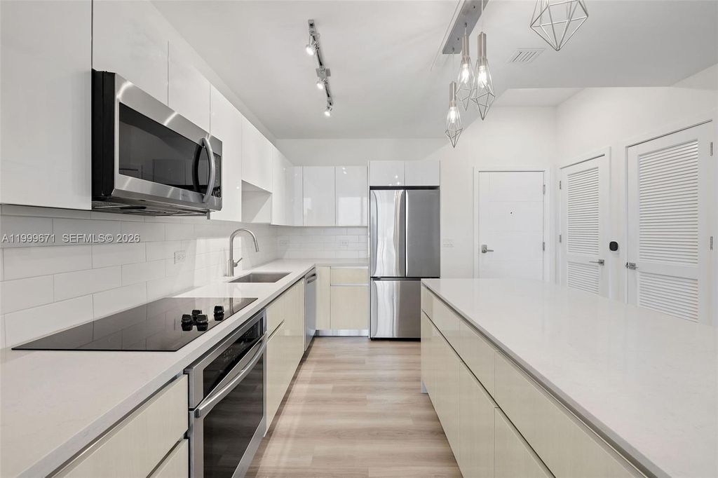 Photo of 101 Diplomat Pkwy #1704, Hallandale Beach, FL 33009 (MLS # A11999671)