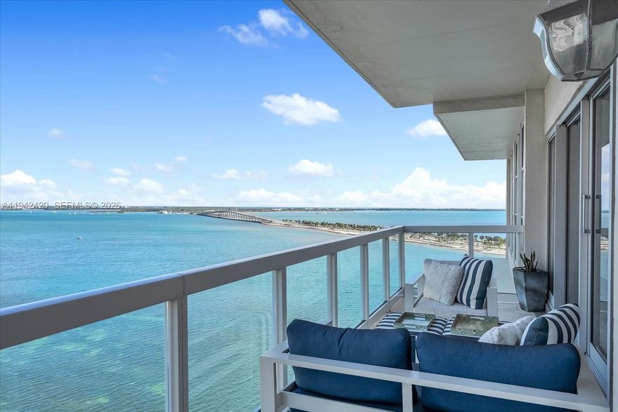 Wake up to breathtaking sunrises and enjoy your daily coffee overlooking beautiful Biscayne Bay. This rare corner residence has been thoughtfully redesigned by a professional interior designer and showcases stunning water views from every room through brand-new impact windows. Originally configured as a three-bedroom, the home now features a spacious, open-concept layout with a fully equipped kitchen, dining and living areas, plus a dedicated laundry room with custom cabinetry.

The primary bathroom offers a true spa-like retreat, complete with a freestanding soaking tub and a walk-in shower with sauna-style features. A generously sized office comfortably accommodates two work-from-home setups and can easily be converted back into a bedroom if desired.

Brickell Townhouse delivers resort-inspired amenities including a swimming pool, fitness center, tiki cabanas, playground, tennis courts, on-site mini market, valet service, and more. Ideally located in a quieter section of Brickell, with quick access to I-95, Coconut Grove, and Key Biscayne. HOA fees cover one covered parking space, water, air conditioning, and basic cable and internet.