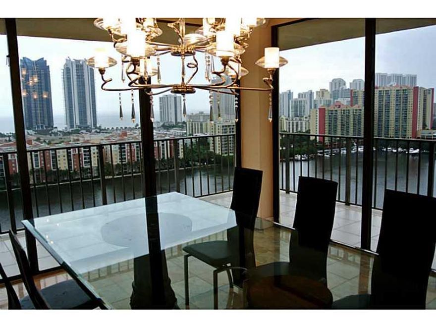 ENJOY BREATHTAKING OCEAN AND INTRACOASTAL VIEWS FROM EVERY ROOM AND FROM THE OVERSIZED WRAPAROUND BALCONY! This remodeled and mostly furnished condo has a spacious layout allowing for lots of privacy. It has plenty of built in closets with W/D inside the  unit. The condominium was recently renovated, and it offers all imaginable amenities, such as pool, tennis court, gym, bike storage, billiard and meeting rooms. The building is just a short stroll away from the beach.