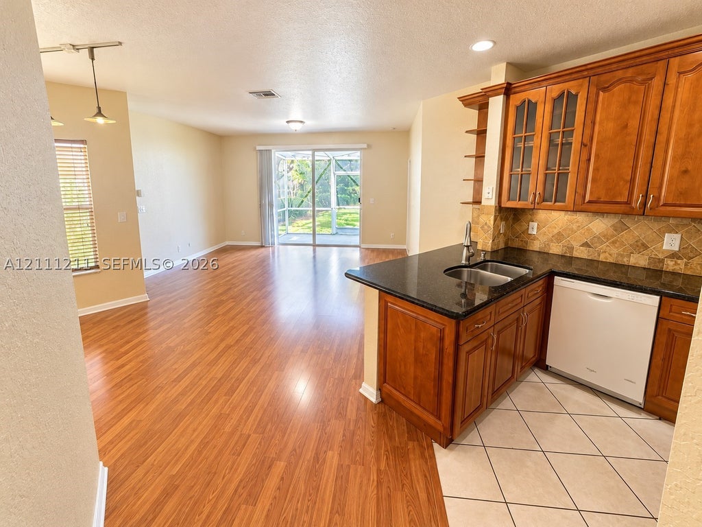 Photo of 8941 NW 54th St, Sunrise, FL 33351 (MLS # A12111211)