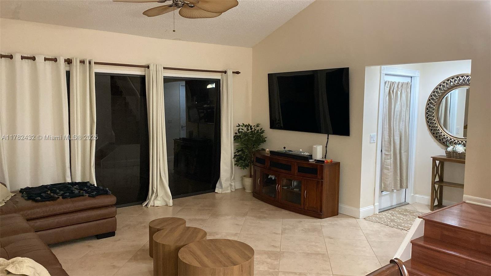 maintained Lot Stunning 2-Bedroom townhouse for Sale located East of US1. you can walk to the beach, or enjoy the community pool and clubhouse, local parks, restaurants, shopping, 1 mile to houses of worship, and easy access to all major highways and airport. Bedrooms have new Berber carpet with walk-in closets. Bathrooms are updated with new vanities, toilets, tile floors, fixtures, mirrors, faucets & hardware. The loft area is perfect for a home office. The large laundry room, with plenty of storage, has new washer-dryer and new water heater. Newer hurricane proof front door and skylight, accordion shutters for all sliding doors.