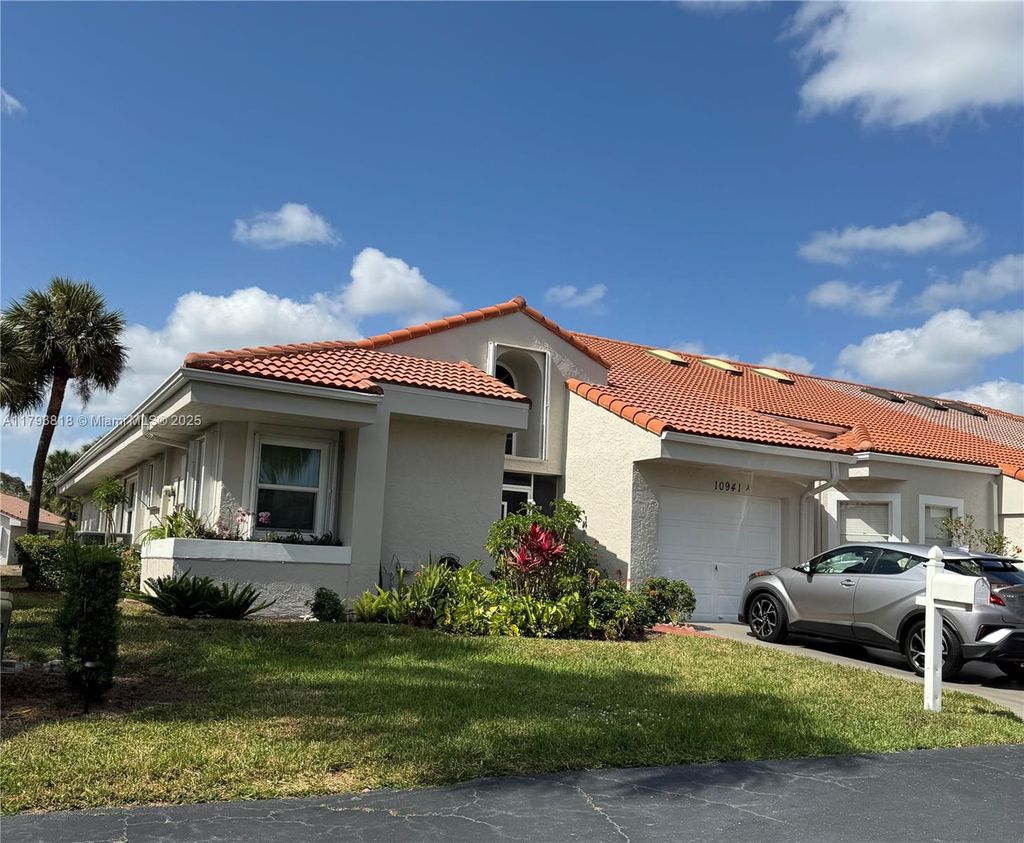 Photo of 10941 Lakemore Ln #A, Boca Raton, FL 33498 (MLS # A11793818)