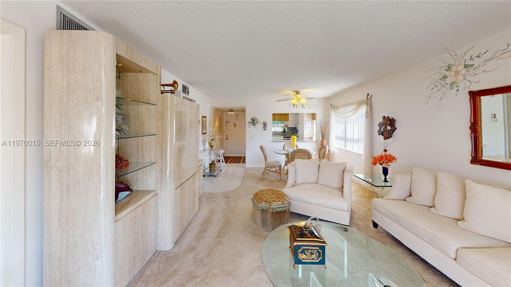 Photo of 9681 Sunrise Lakes Blvd #201, Sunrise, FL 33322 (MLS # A11970015)