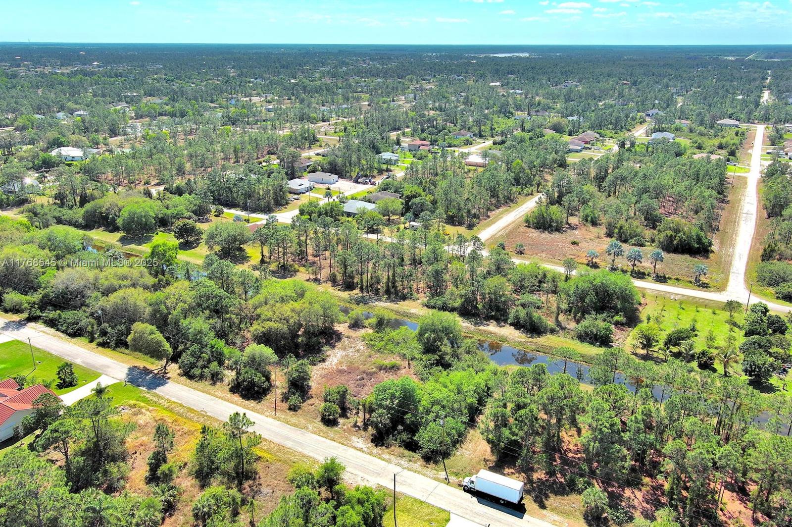 Exclusively presented by Sunland Real Estate: Prime .30 acre waterfront residential lot in a very good location close to everything. Close to Homestead road that takes you to Lee Boulevard where all shopping and amenities are. This lot is unique because it is surrounded by green space that is walk able. This lot is ready for development. Sitting high and dry, this lot offers an excellent opportunity to build in one of Southwest Florida’s fastest-growing communities. Lehigh Acres is known for its affordable land, friendly neighborhoods, and convenient access to Fort Myers. Just a short drive from shopping, dining, and the breathtaking Gulf Coast beaches, this property offers an excellent opportunity to develop your next project in a thriving and fast-growing community.