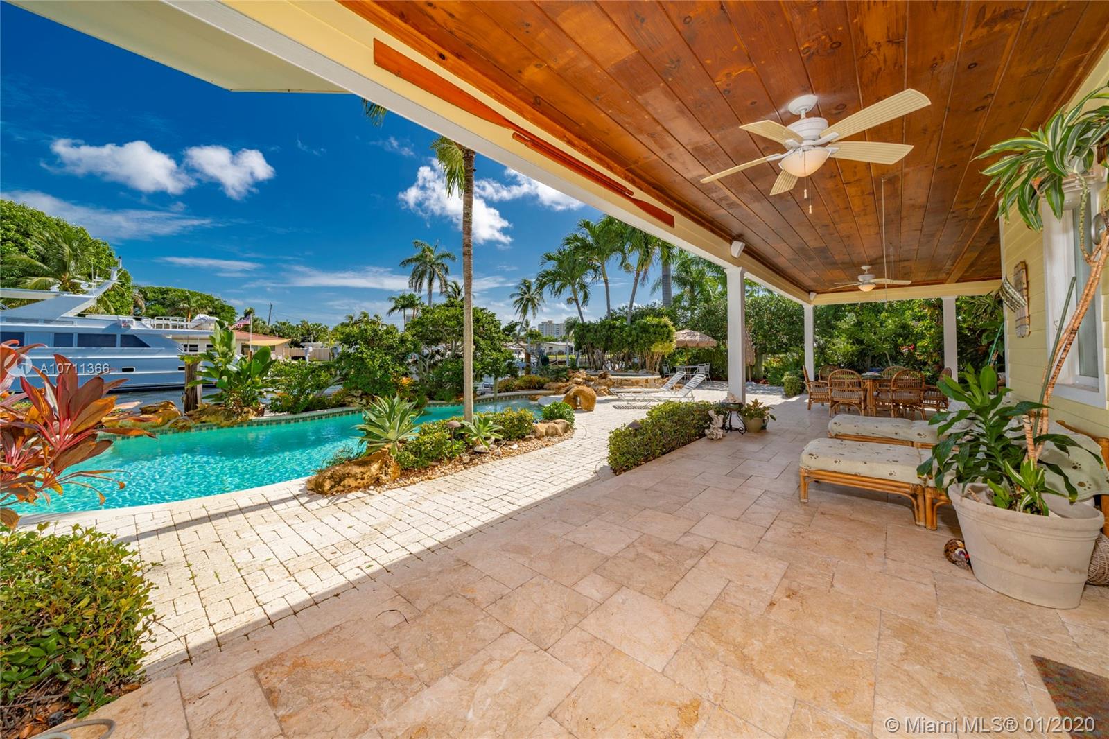 Custom HGTV featured Key West style home is ideal for a large yacht with 132.5 Ft of protected waterfront dockage just 1/4 mile from Hillsboro Inlet including gated beach access. Open concept kitchen, family and dining area. Master suite with private bath and separate sitting room. Hardwood and tumbled marble floors through out including a gas fireplace. Flexible floor plan great for rental options or investment. Impact glass doors and windows. New Dual AC system on first floor under warranty. Great views of Intracoastal waterway and the Hillsboro Lighthouse. Additional Outdoor features include Salt water conversion pool with a waterfall spa, gas fire pit, tropical landscaping, dock and boat lift.