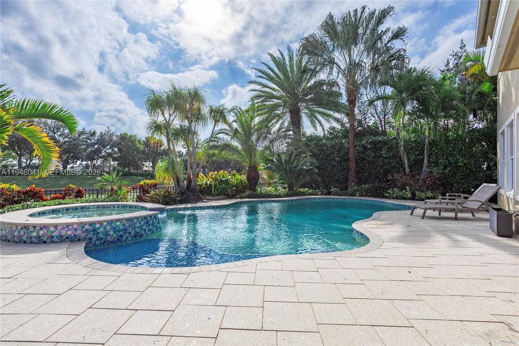 Photo of 12074 NW 79th Ct, Parkland, FL 33076 (MLS # A11946041)