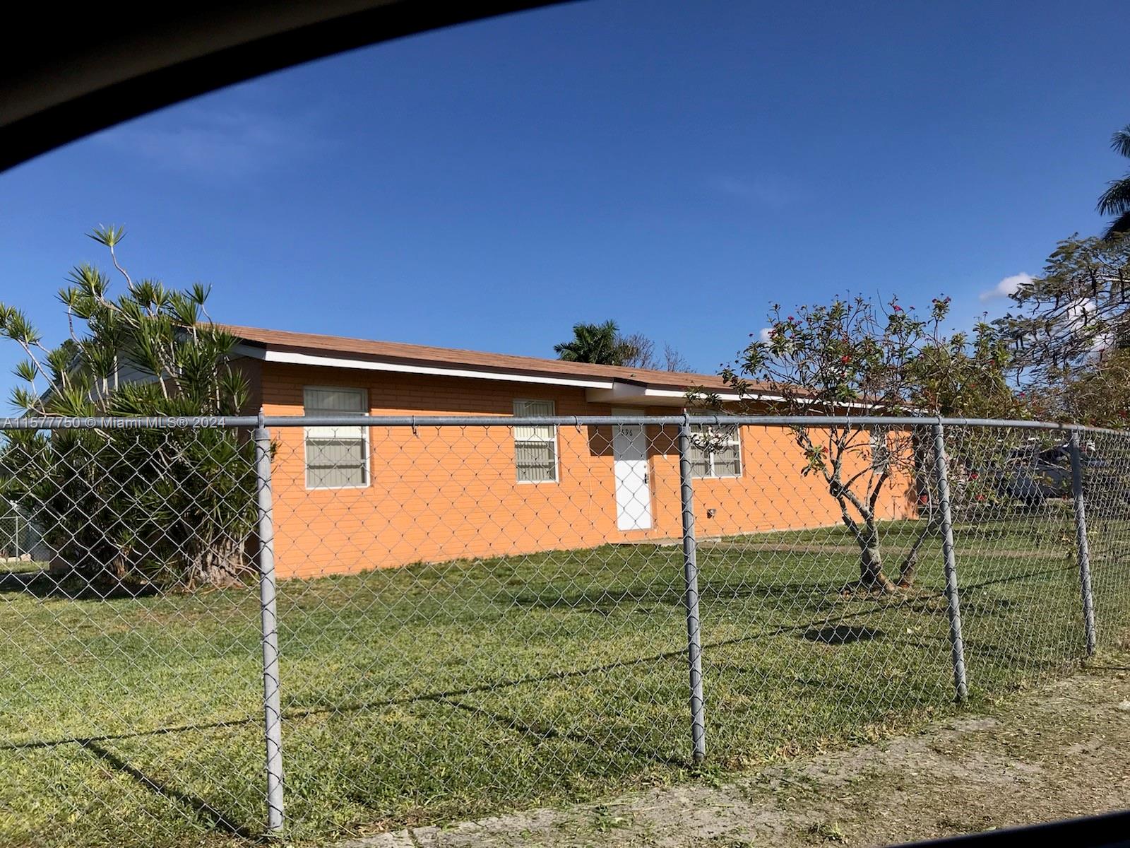 Great 4/2 Home located near great schools. Corner lot with a big yard. Freshly Painted. Tiles throughout.