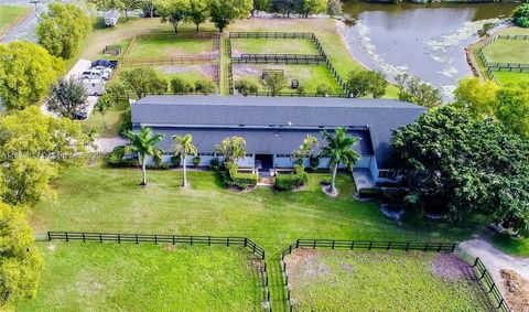 Photo of 14390 Palm Beach Point Blvd, Wellington, FL 33414 (MLS # A11888039)