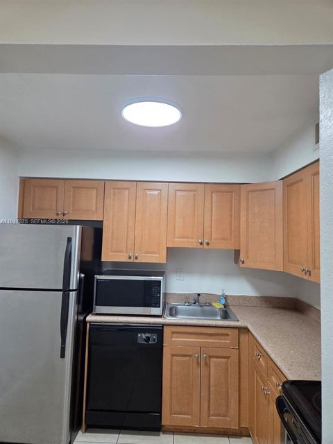 Photo of 5221 Geneva Way #302, Doral, FL 33166 (MLS # A11947375)