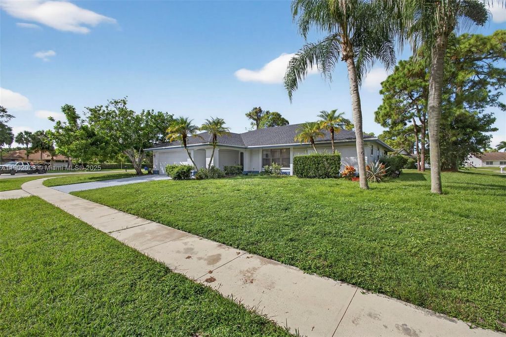 Photo of 100 Miramar Ave, Royal Palm Beach, FL 33411 (MLS # A11902023)