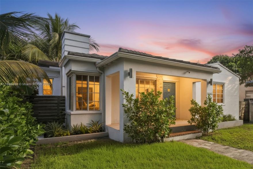 Step into the allure of this 3 bedrooms, 3 bathrooms + office room, plus a separate 1 bed/1 bath guest cottage. Located just 7 minutes from the Design District. This home is surrounded by walkable dining, cafés, gyms, yoga studios, and the MiMo District’s vibrant shops. Inside, enjoy light-filled open living spaces with high ceilings, wood floors, a stone fireplace and a Florida/media room that easily flexes as an additional bedroom. The updated kitchen flows seamlessly into the spacious dining area. The tropical backyard features a hot tub/Jacuzzi, dining pergola, avocado & banana trees, and plenty of space to add a pool or expand. Charming front porch and lush gardens. additional perks includes an updated roof, AC, water heater, oversized lot, gated motorized entry & parking.