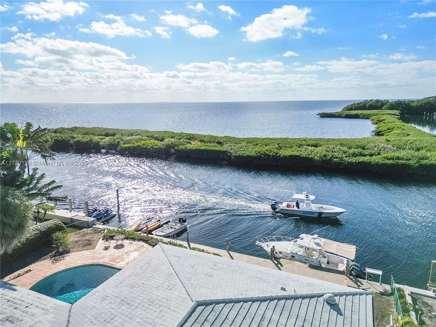 Rare & Exceptional Opportunity to acquire Biscayne Bay/Atlantic Ocean property to build custom home of your dreams. Situated at the end of wide & deep canal in Gables by the Sea, upscale guard gated community of custom waterfront homes in Coral Gables, "the City Beautiful".  Newly built home elevated per code w/ spectacular direct & unobstructed gorgeous views of Bay & ocean. The 12,000 Sq Ft lot has 100 running Ft of waterfront, capable of handling large vessel. Home is larger than Tax Rolls under AC per owner. The area Boasts finest public & private schools, 5 star restaurants, high-end shopping, protected beach, parks, Pinecrest Gardens with community center & library, University of Miami offering endless cultural & sporting events, & the renowned Fairchild Botanical Gardens close by.