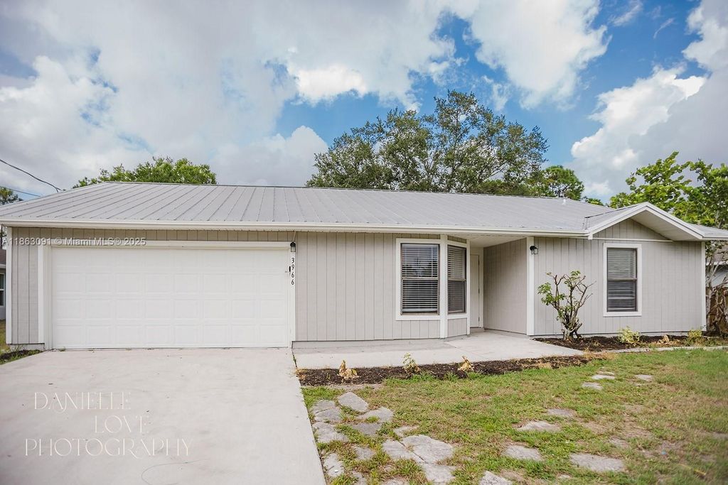 Photo of 3966 SW Brunswick St, Port St Lucie, FL 34953 (MLS # A11863091)