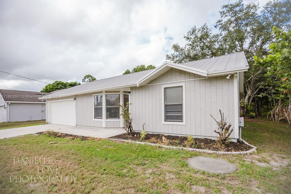 Photo of 3966 SW Brunswick St, Port St Lucie, FL 34953 (MLS # A11863091)