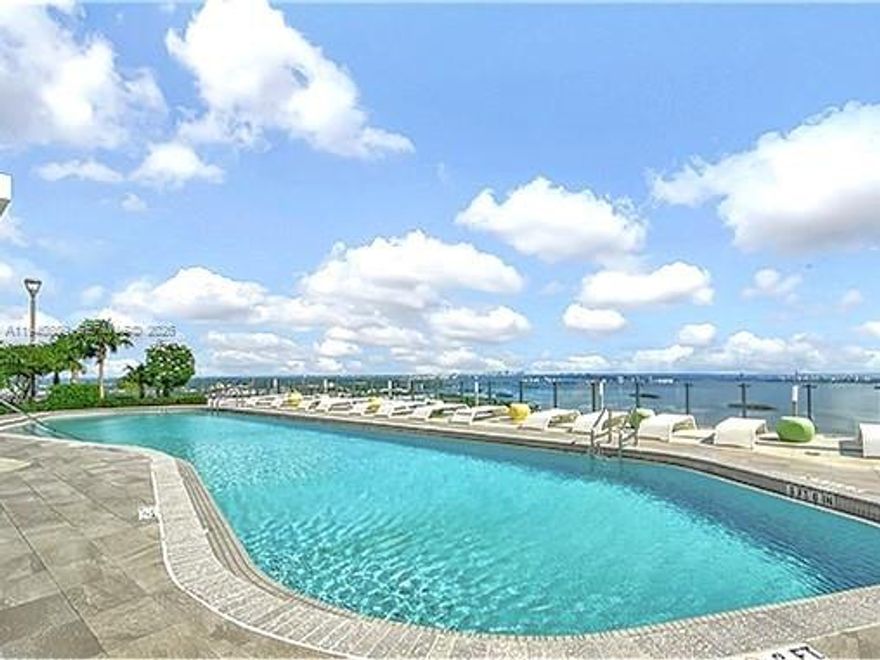 The best price for 3 bedrooms in the building. Just lower it to sell fast—a must-see. Great investment. Located in one of the most desirable neighborhoods in Miami, "Edgewater". Close to the art district, fashion, theaters, and the best restaurants, Wynwood, and Brickell. The location is amazing. Just a bridge away from South Beach. The floor plan is very open and practical. 3 bedrooms and 2 bathrooms. Amenities are incredible:- 2 pools, party room, gym, kids room, tennis court, BBQ area, business center, game room, sauna, movie theater. Great water view. Wrap around balcony with great views.