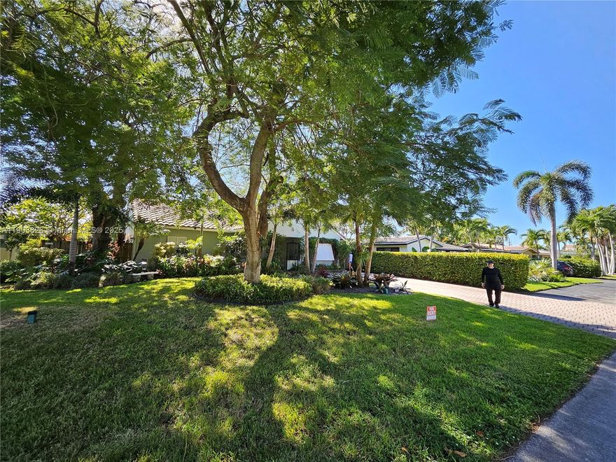 Come home to East Wilton Manors. This 3/2 single family home features a primary bedroom suite measuring 39' x 15', great curb appeal and located in desirable Coral Gardens. Close to dining, shopping, entertainment and only a 3.5 miles drive to Ft Lauderdale Beach. This home offers a kitchen with ample cabinetry, a dining room, and an oversized primary bedroom with dressing area & walk-in closet. Split bedroom floor plan. Impact windows & doors. This home features a large paver patio with a retractable awning.