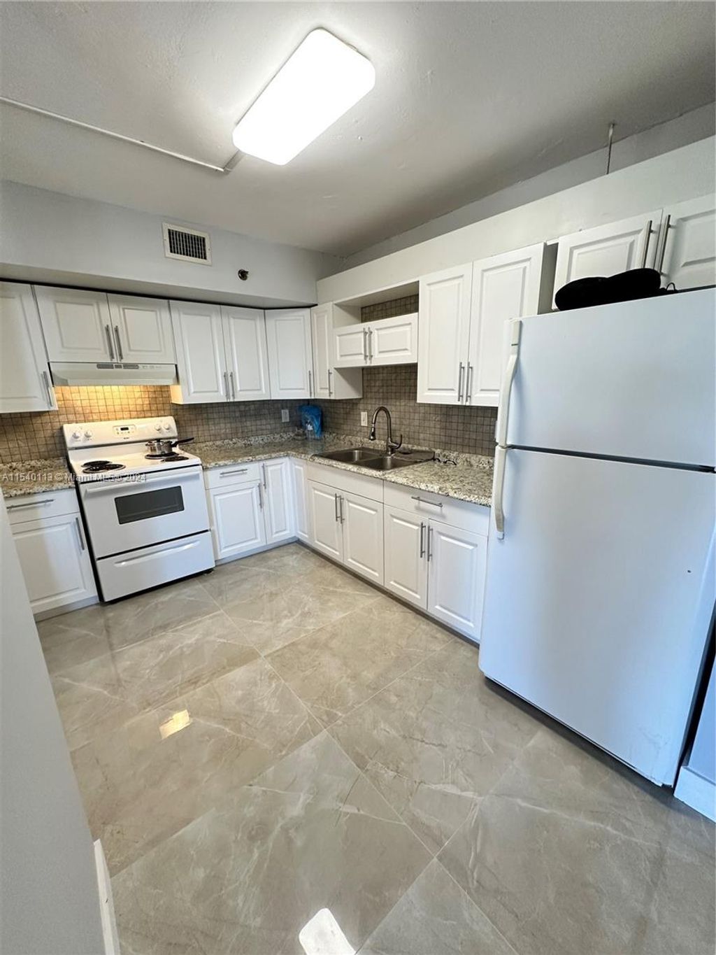 Photo of 901 Hillcrest Dr #315, Hollywood, FL 33021 (MLS # A11540113)