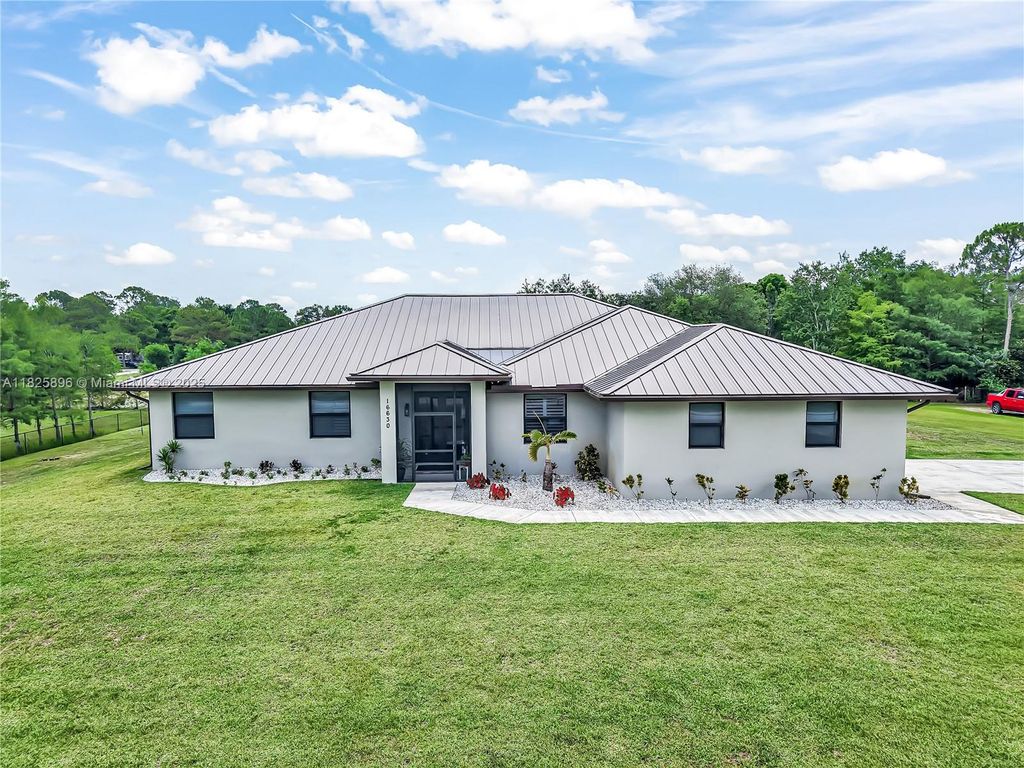 Photo of 16630 N 132nd Ter N, Jupiter, FL 33478 (MLS # A11825896)