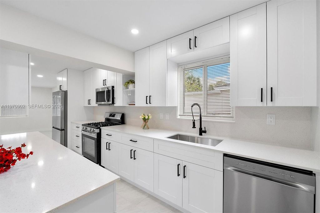 Photo of 3740 NW 9th Ct, Lauderhill, FL 33311 (MLS # A11970902)