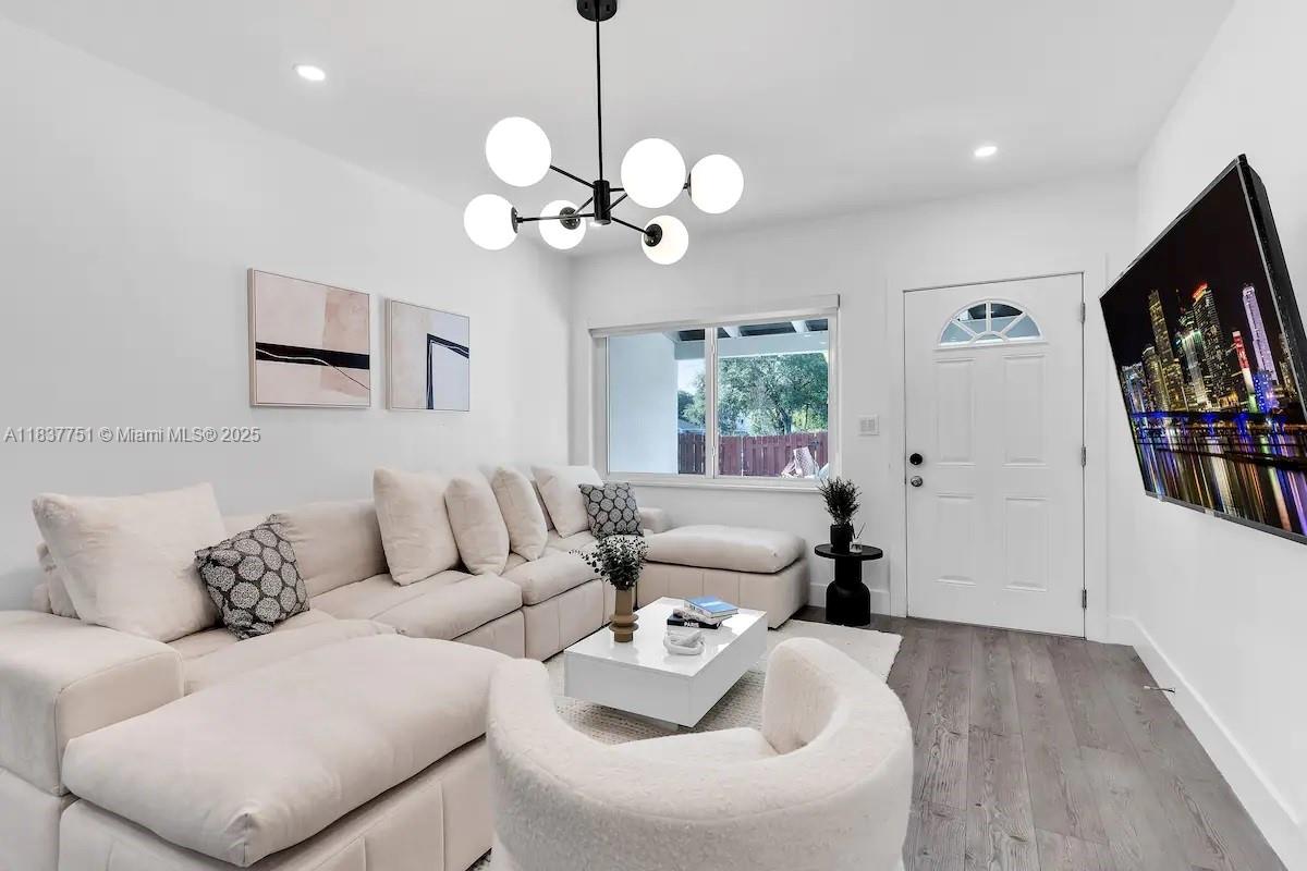 Beautiful modern 4 BR 2 BA Single-Family Home PLUS garage. Renovated and fully furnished, stainless steel appliances, professionally designed 4 bedroom, 2 bathroom furnished home for rent with garage attached! Washer and dryer in unit. Very bright, with lots of windows. Conveniently & centrally located very close to Miami Design District, Wynwood, MIMO District, and future Magic City Development. Just a couple blocks from Biscayne Blvd. with plenty of shopping, restaurants, cafes & more. Large yard with lots of grass, entire property is fenced in, plenty of parking. Entire property is private with a large fence surrounding the house. Plenty of yard space & very private. Fenced in parking on site & plenty of free street parking all around the property.
