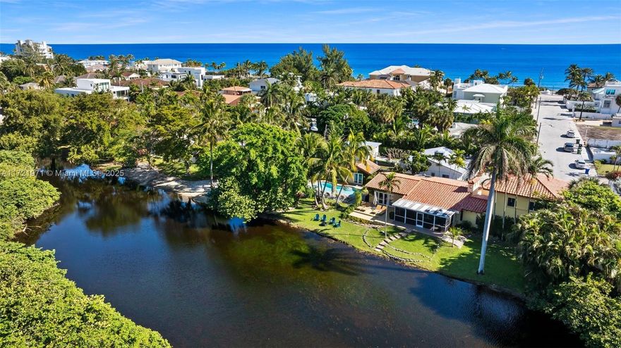 Tucked away in an exclusive beach neighborhood, this beach home is one of just 18 homes directly on Birch State Park’s pristine freshwater lagoon.  Offering unmatched privacy, the residence features a 3-bedroom main house along with a 1-bedroom guest cottage, complete with its own kitchen and full bath.  The home features vaulted ceilings with beautifully renovated kitchen and baths. The spacious primary bedroom offers stunning views of the lagoon, as well as the freeform pool, spa, and waterfall.  Expansive outdoor areas provide the perfect setting for canoeing, paddleboarding, kayaking, relaxing, entertaining, and dining amidst lush tropical landscaping.  The home is currently a Vacation Rental, set up as 7 bedrooms.  Must see this home in such a tranquil setting in East Fort Lauderdale!