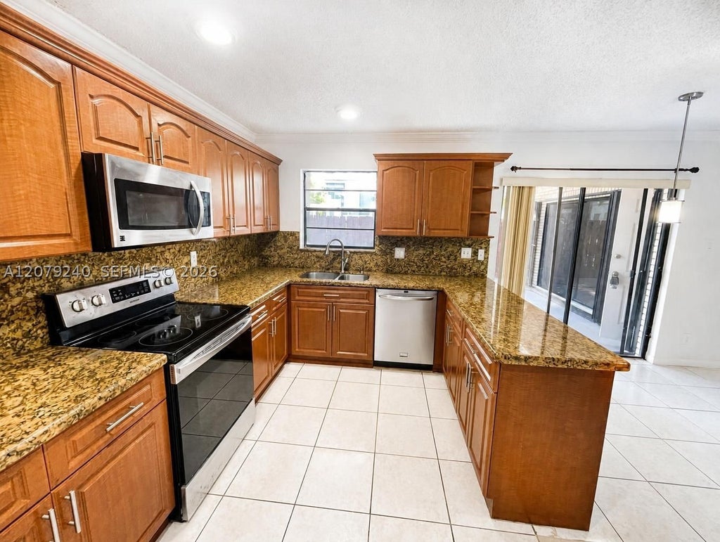 Photo of 8215 SW 23rd Ct #17D, North Lauderdale, FL 33068 (MLS # A12079240)
